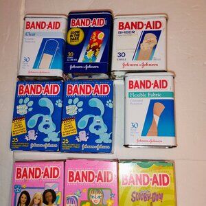 Assortment of Bandaid metal and paper boxes